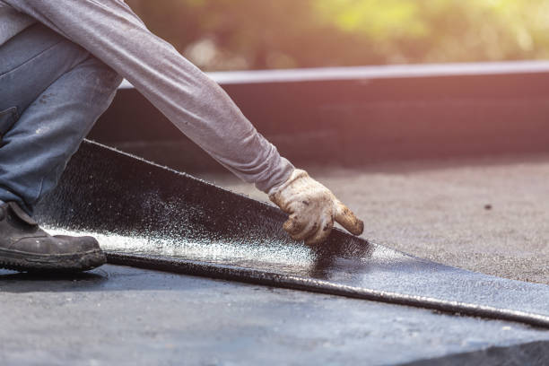 Professional Waterproofing technician working in Westport, IN